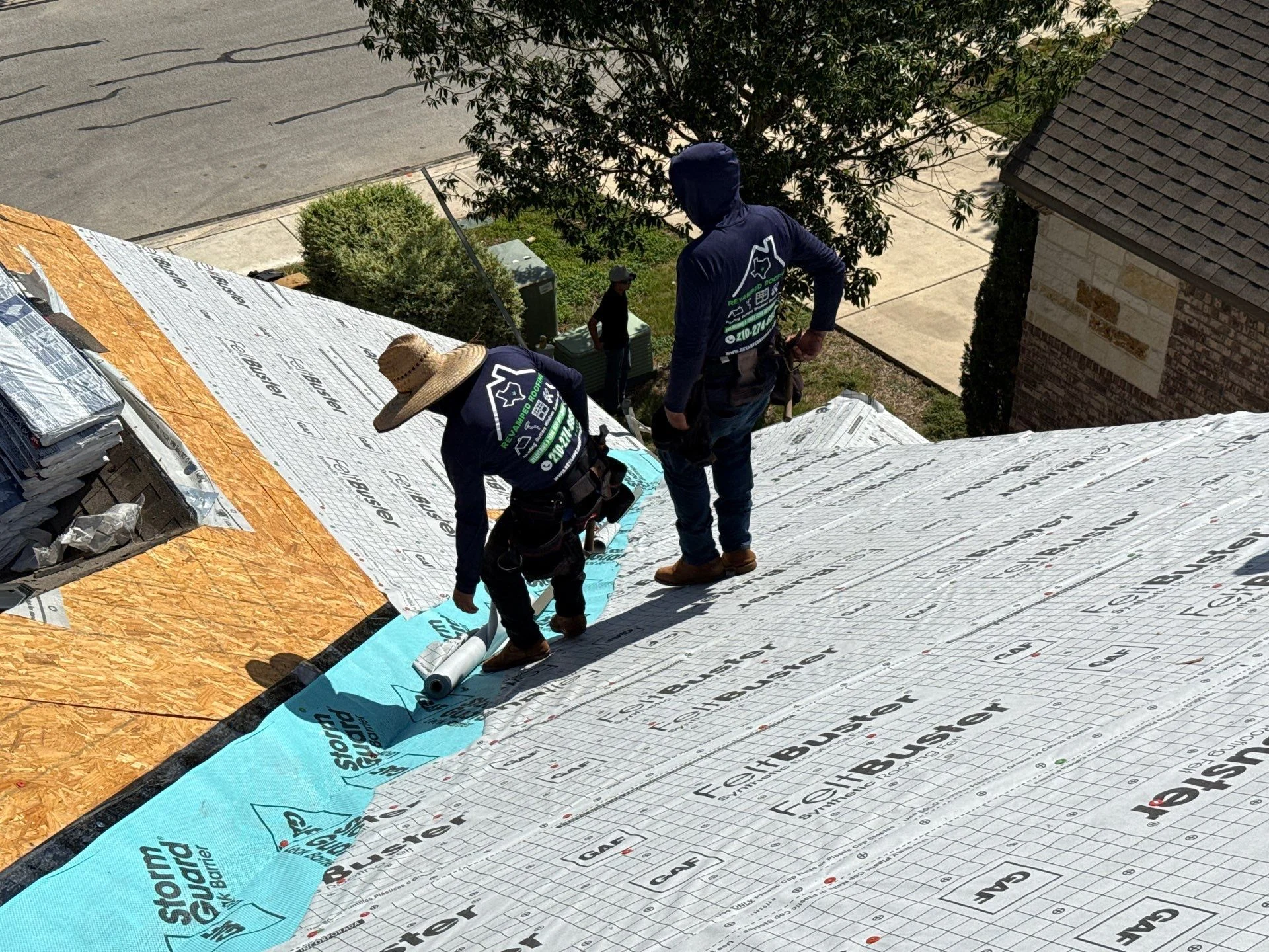 Revamped Roofing crew installing a complete roof system