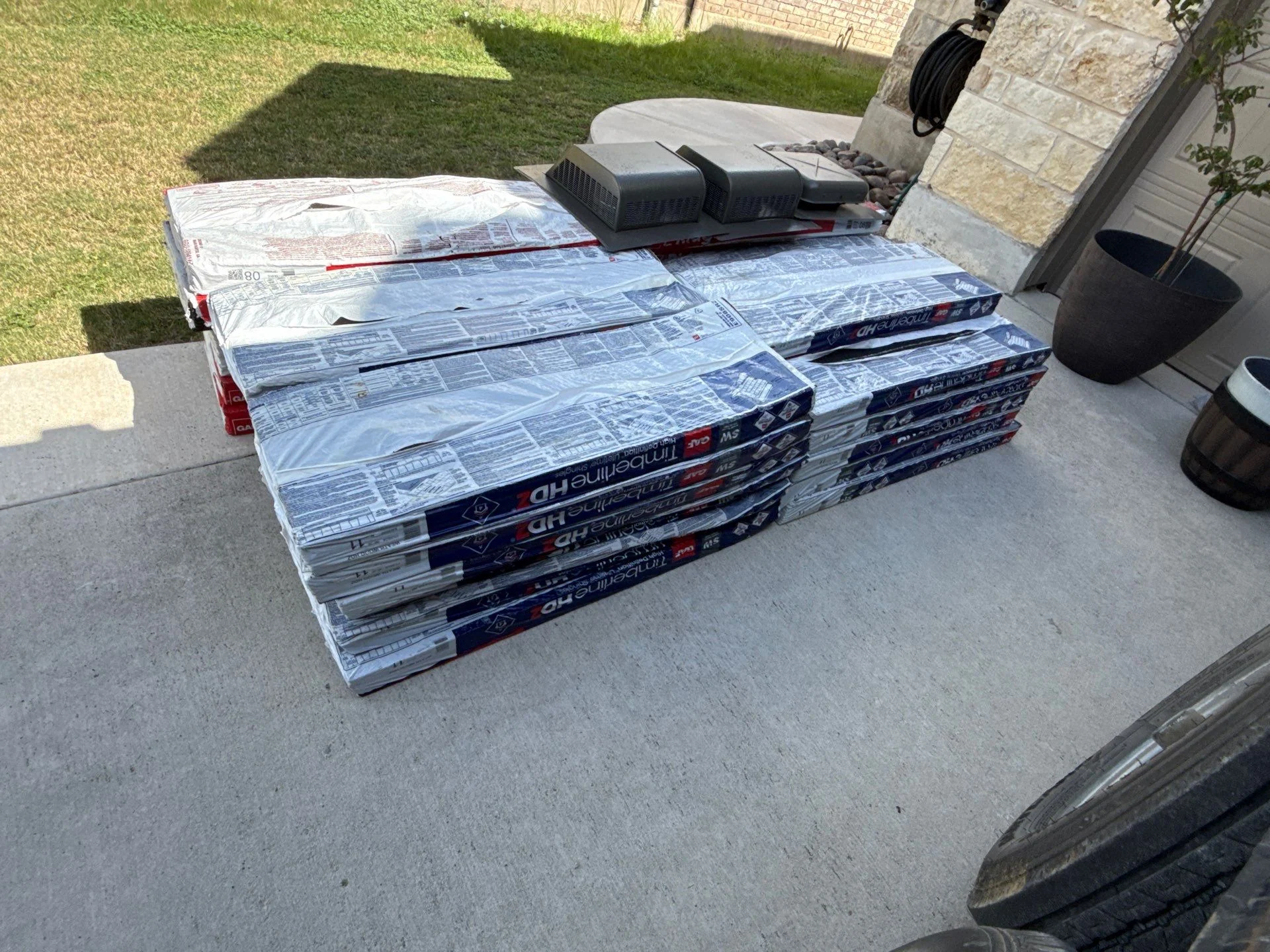 GAF Timberline HDZ roofing materials ready for installation