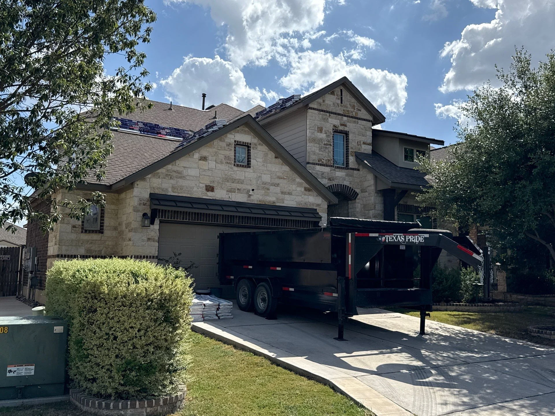 Revamped Roofing project staged with roofing materials