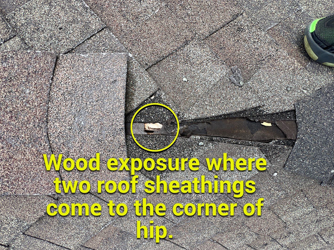 Exposed wood where roof sheathing meets at a hip