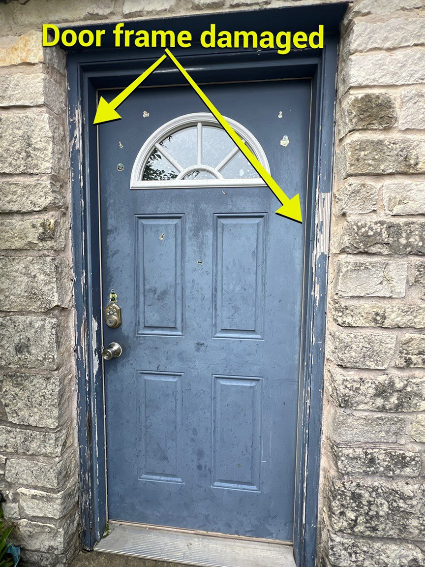 Storm-damaged exterior door frame