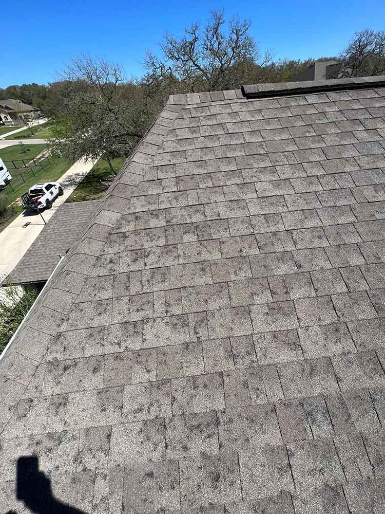 Roof slope viewed during a storm-damage inspection