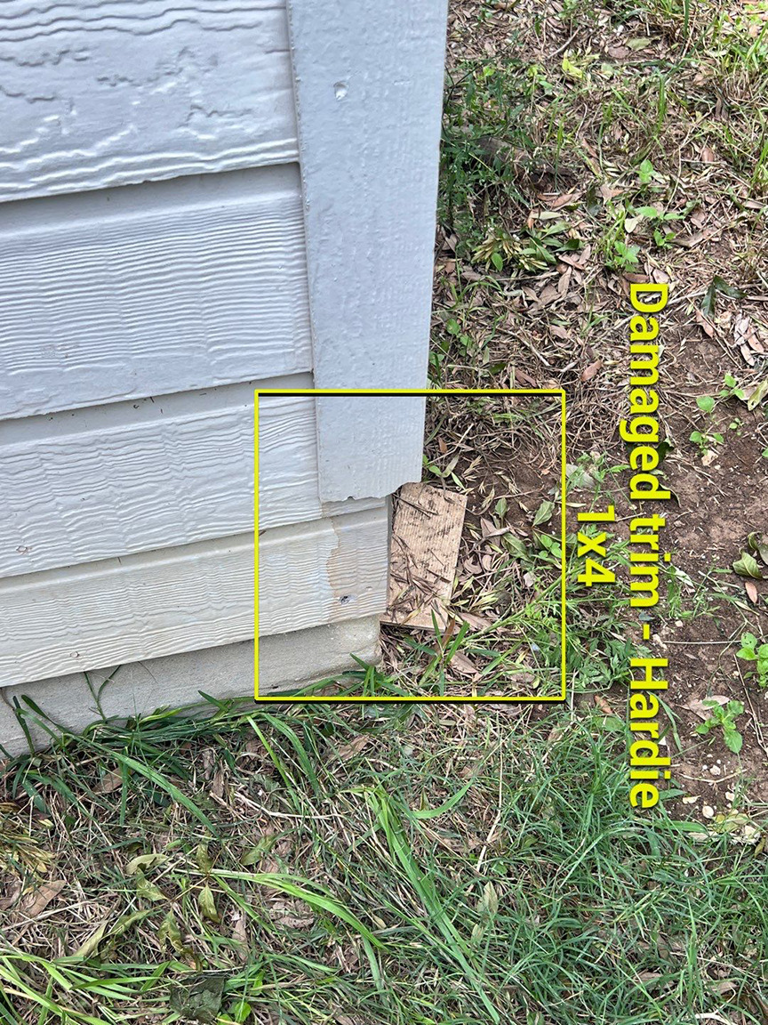 Storm damage documented on exterior siding
